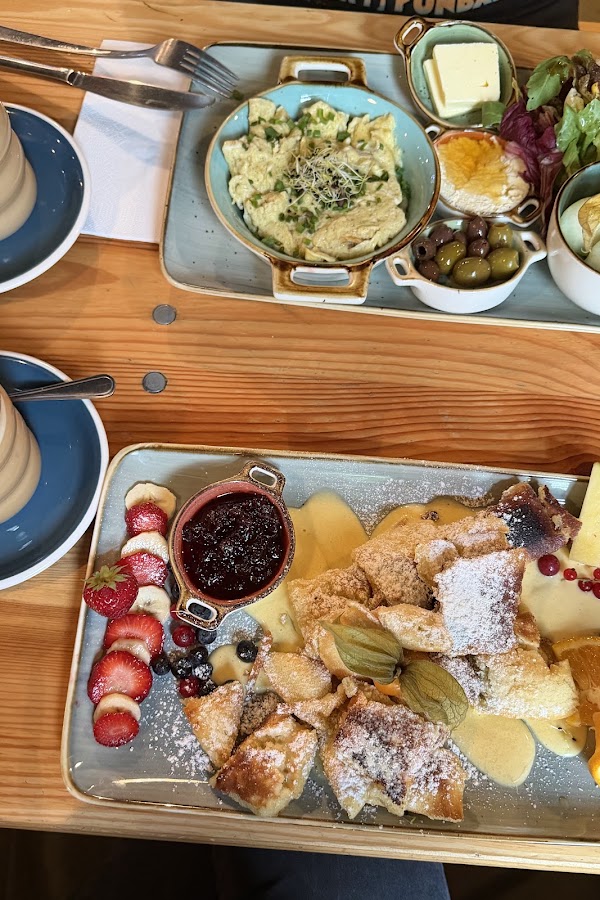 Scrambled eggs and kaiserschmarrn breakfast